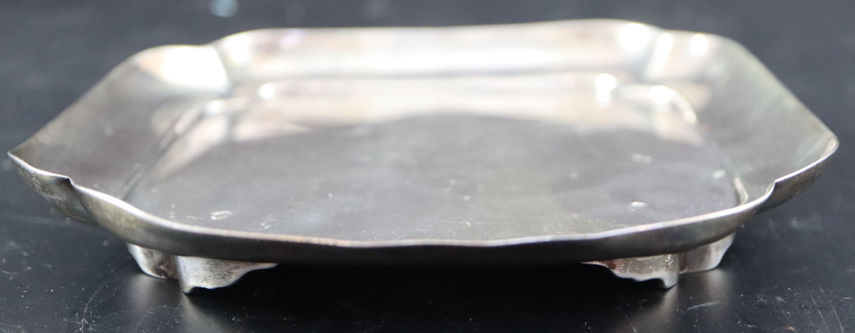 A George III silver shaped square waiter or stand, 14.7cm, 5oz.